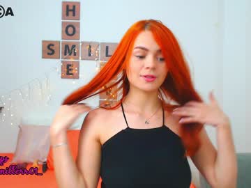 Hottie with red hair and bunny ears is getting fucked on the sofa